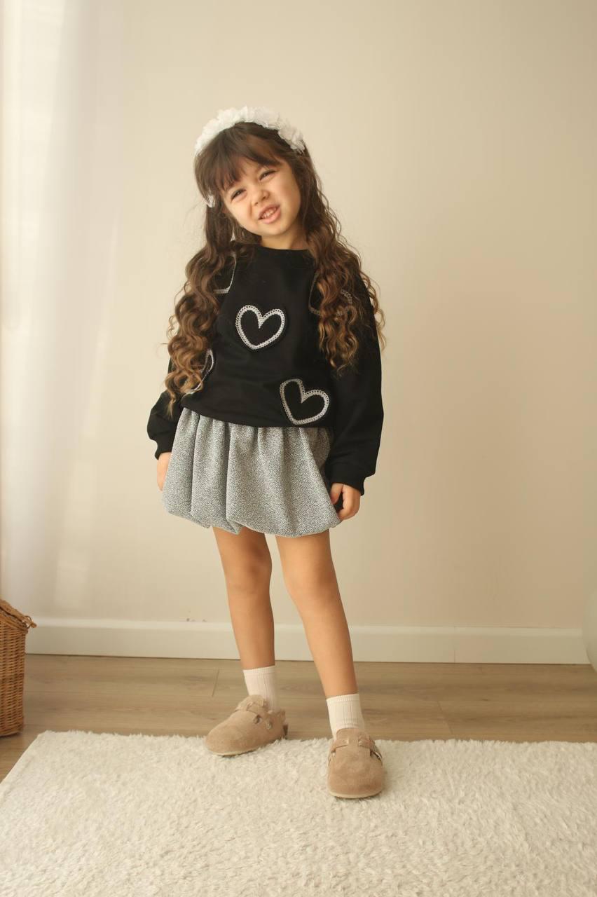 Children's set - black sweater and skirt with ruffles
