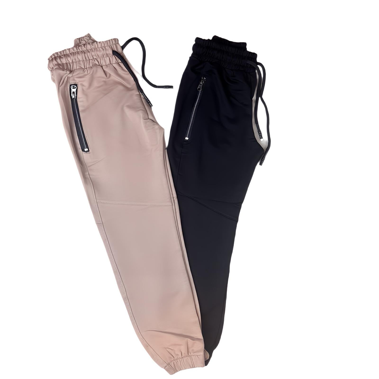 Boys' tracksuit bottoms - practical and modern design (Sizes 110-134)
