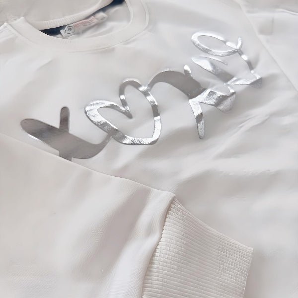Modernes Kinder-T-Shirt mit XOXO-Aufdruck und seitlichem Reißverschluss