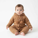 Winter knitted overalls for babies with a hood