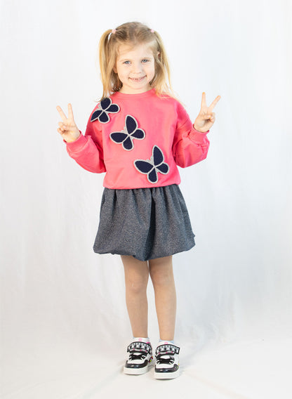 Children's set - pink sweater and skirt with ruffles