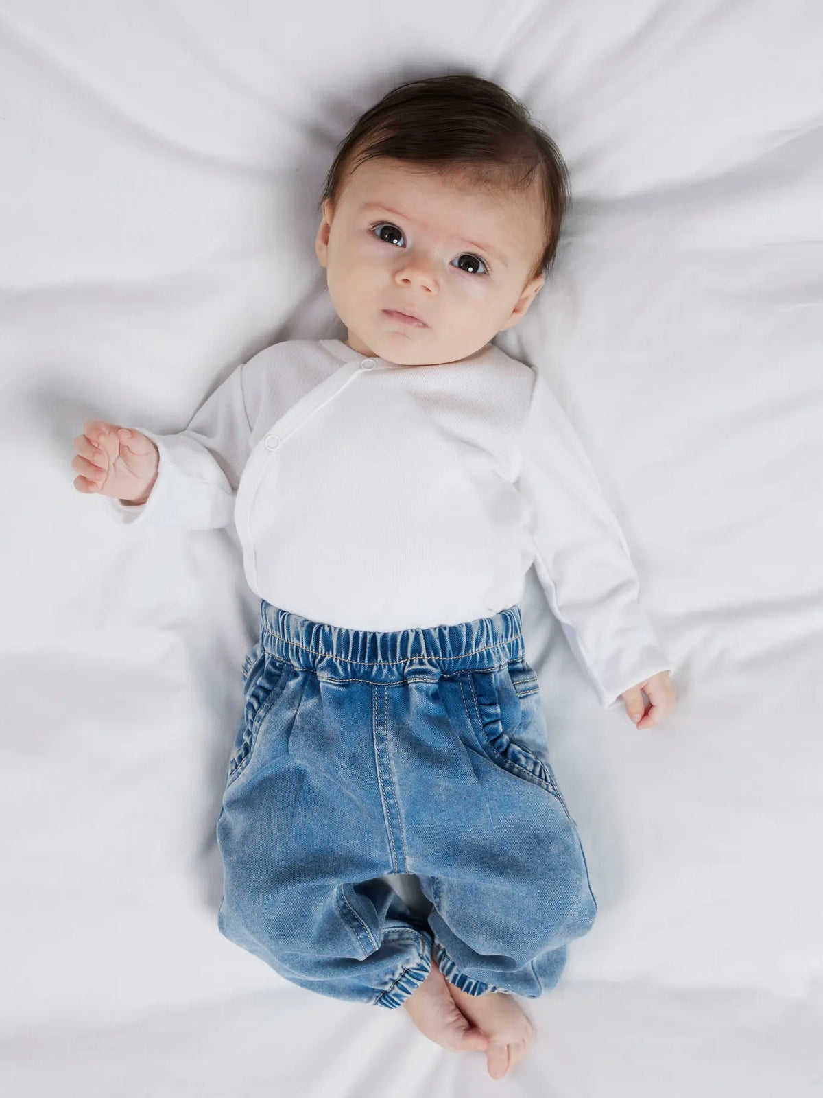 Name It baby jeans with ruffles on the pockets