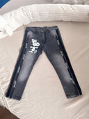 Jeans with Snoopy motif