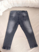 Jeans with Snoopy motif