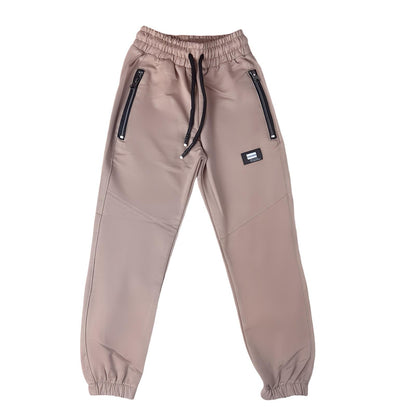 Boys' tracksuit bottoms - practical and modern design (Sizes 110-134)